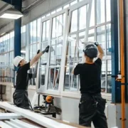 workers installing window stockcake